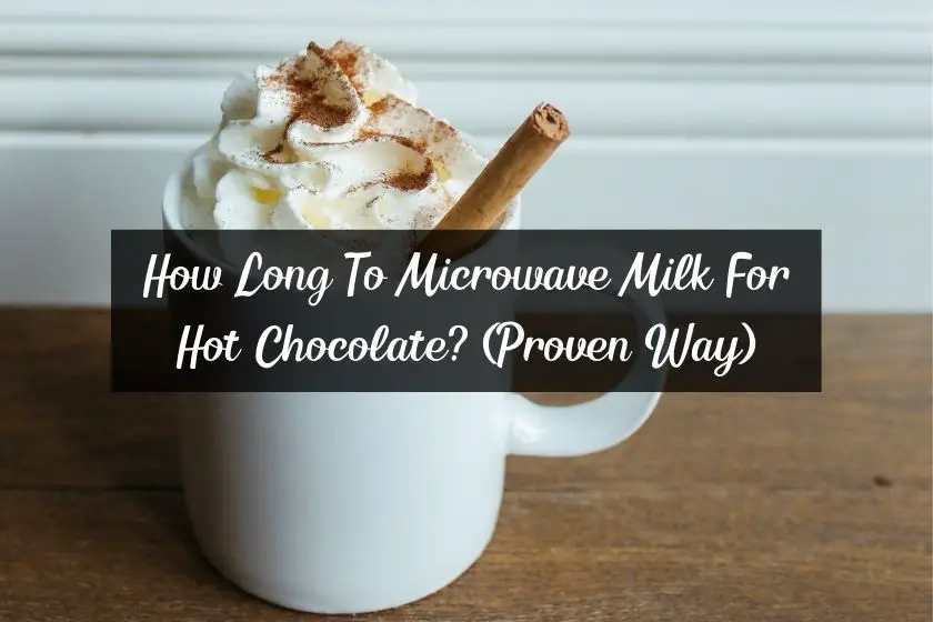 Hot chocolate with whip cream, cinnamon, and a cinnamonstick